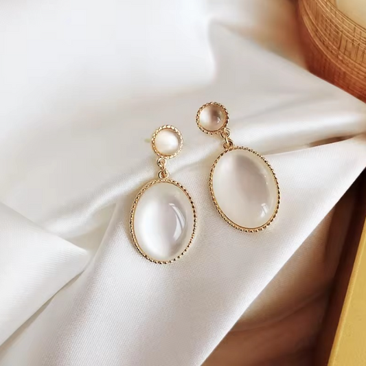 Beautiful Opal Oval Drop Earrings Showcasing a Radiant Glow