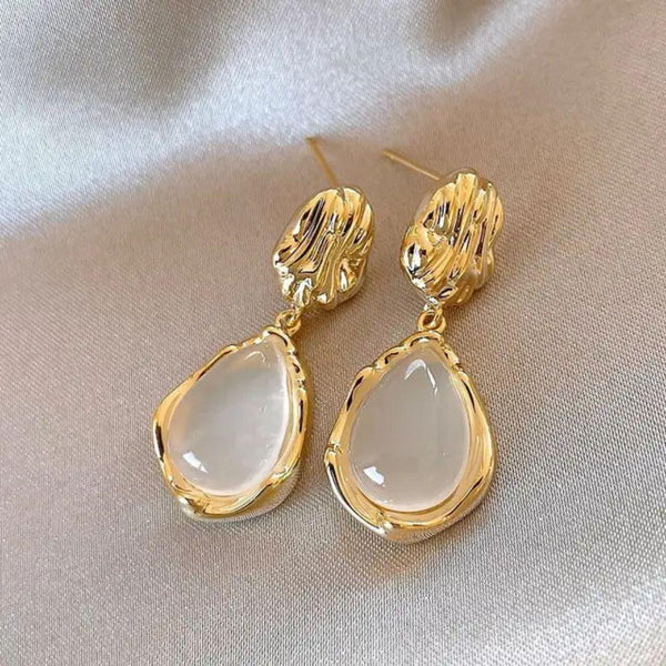 Golden and white water droplet opal style stainless steel earrings for women