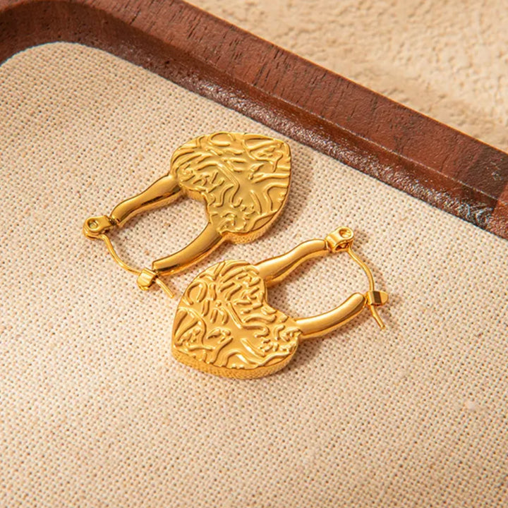 Golden brass heart lock earrings for women